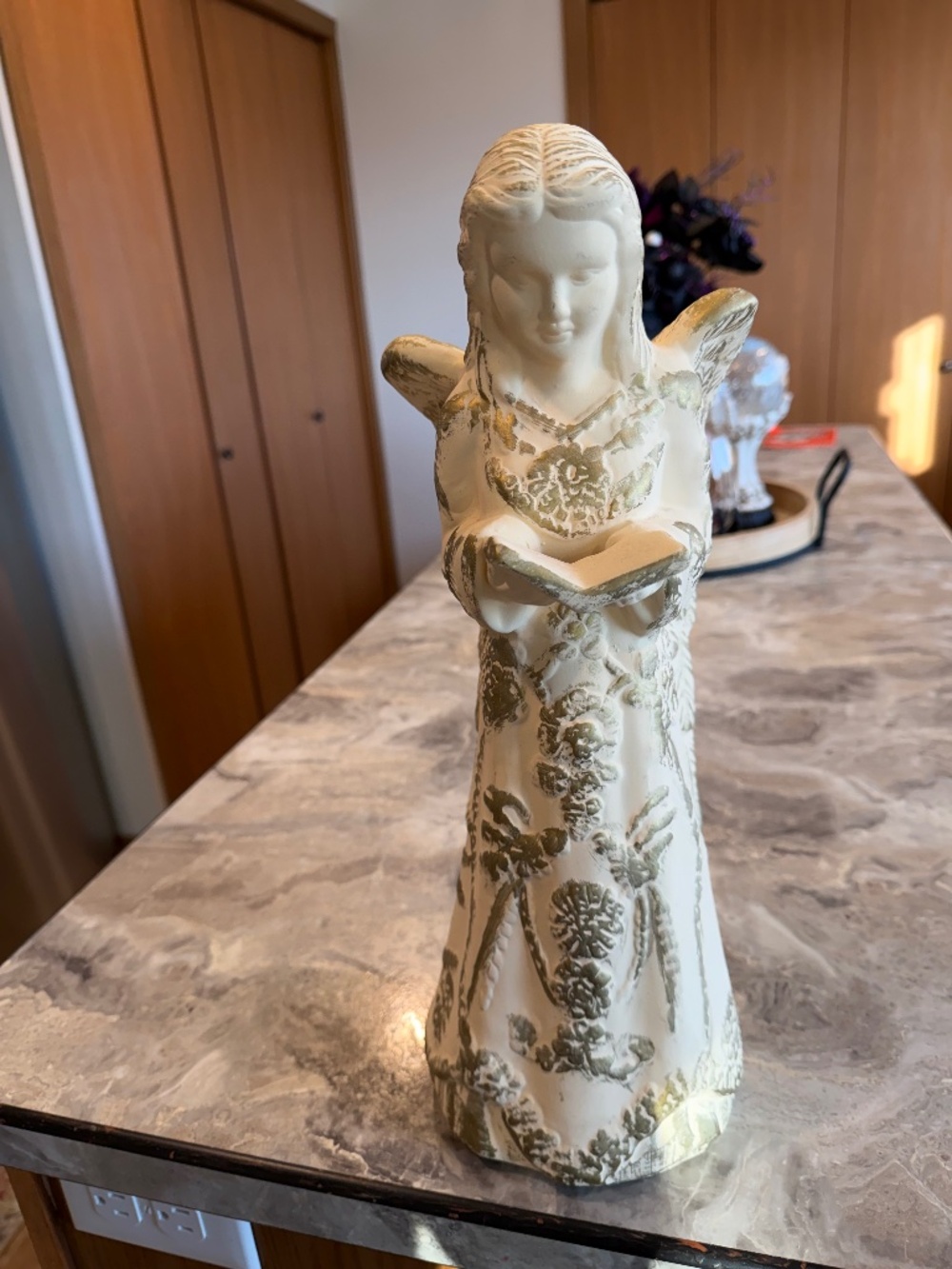 Beautifully made resin angel by home and garden holding a Bible 16 inches tall